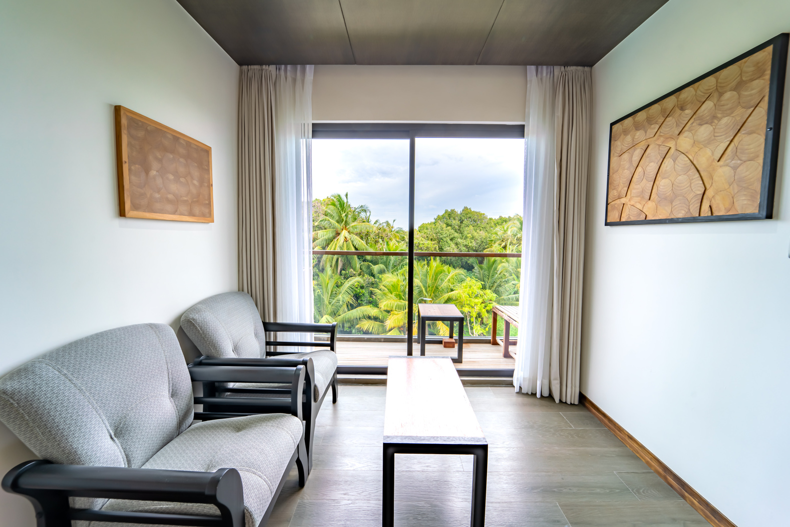 Deluxe Room lounge and balcony