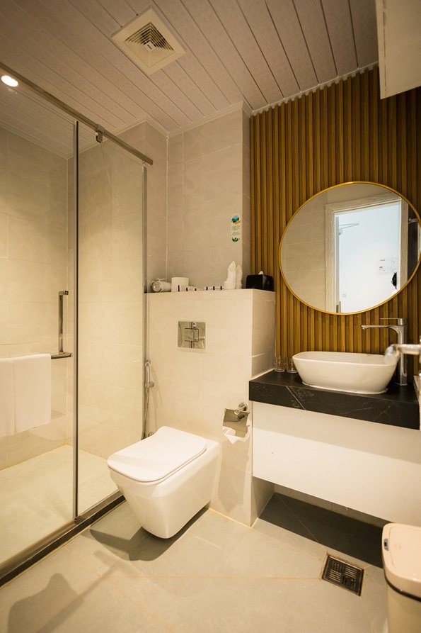 Modern ensuite bathroom at Beach Hotel Guraidhoo