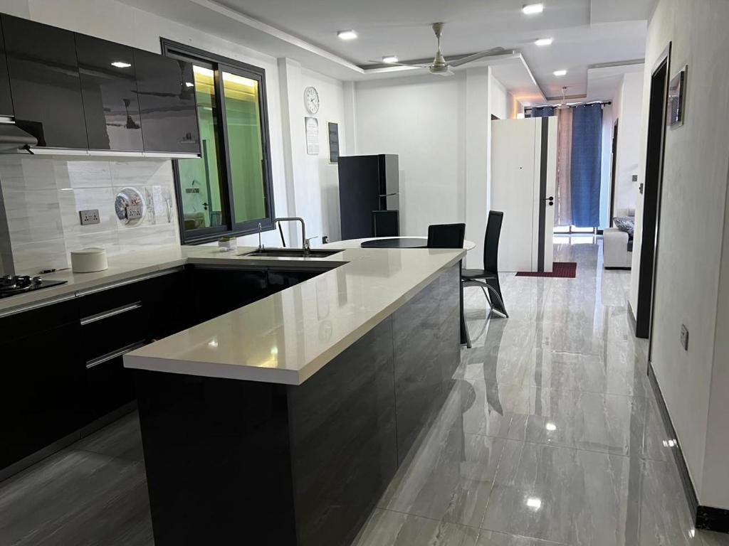 Modern shared kitchen at Quest by Entrance