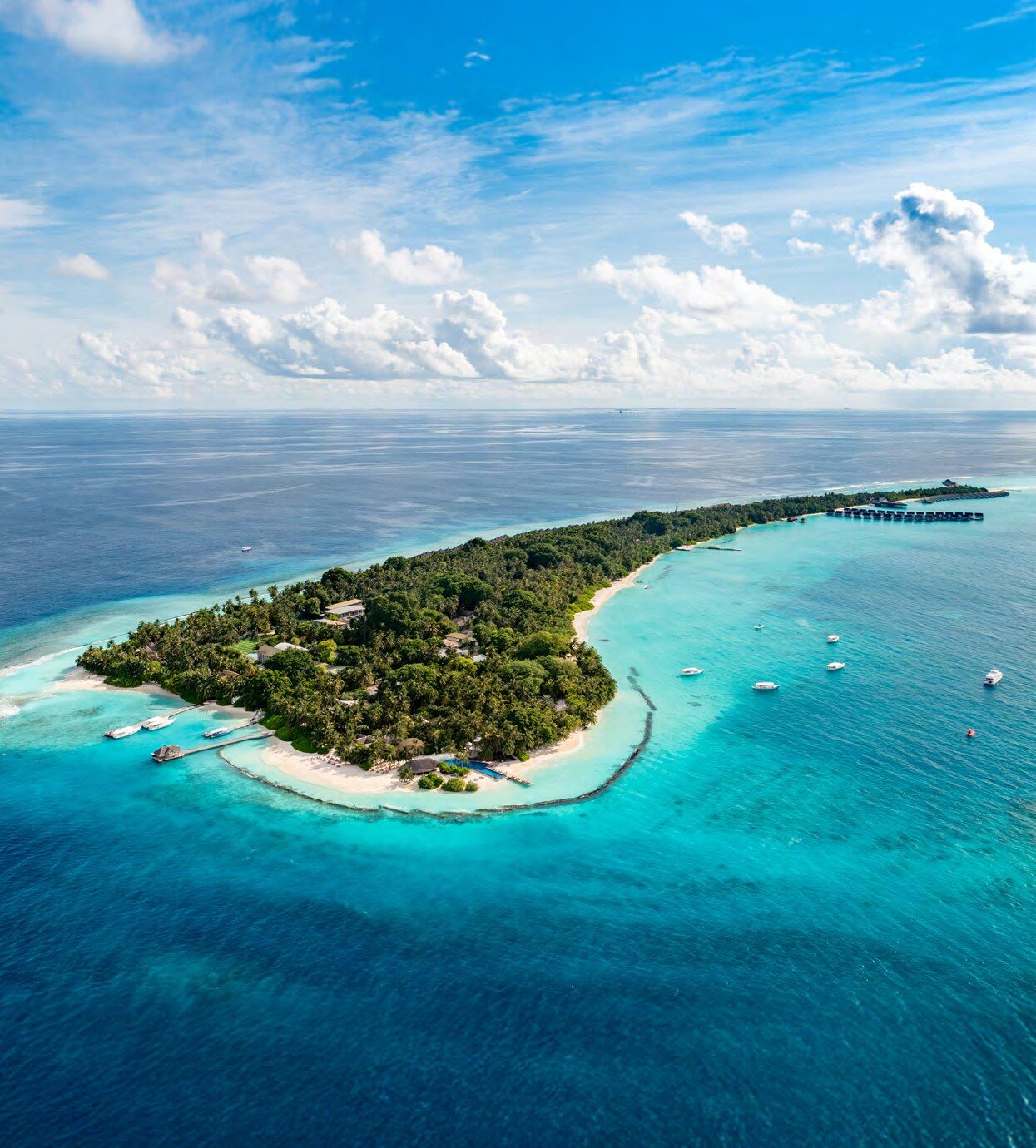 Aerial view of Niva Kuramathi Maldives island and lagoon