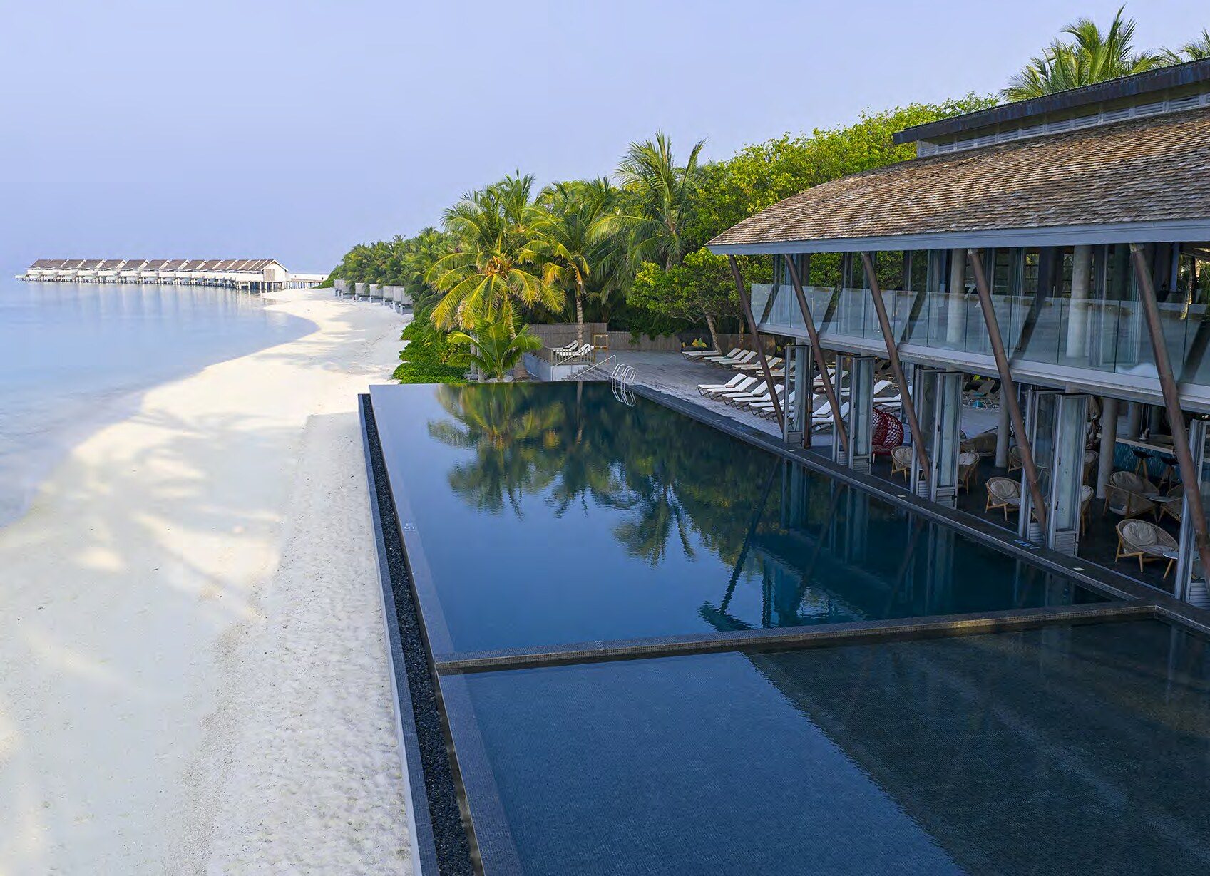 Infinity pool beside the beach at Niva Kuramathi